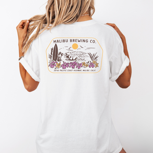 White t-shirt with Malibu Brewing Co. graphic on a plain background